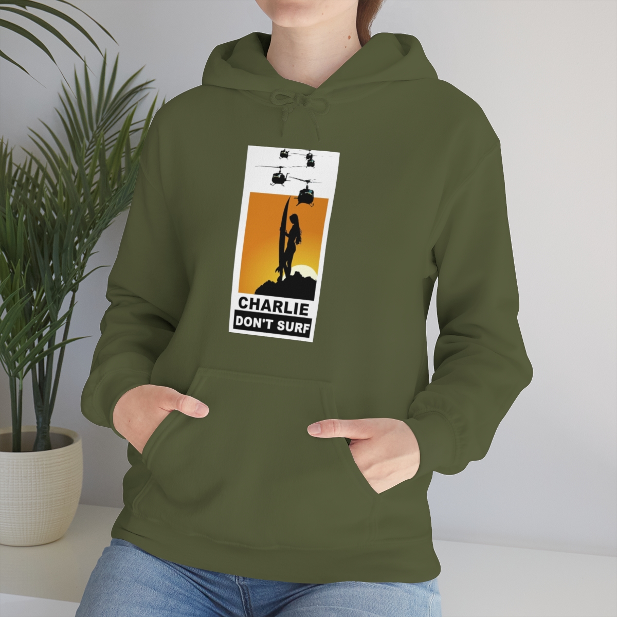 Charlie Don't Surf (Lady Surfer) Printed on a Unisex Heavy Blend™ Hooded Sweatshirt - Image 25